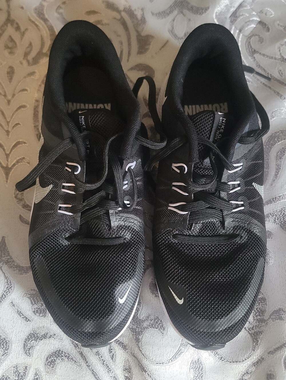 Nike Womens Black Athletic Running Shoes with White Accents